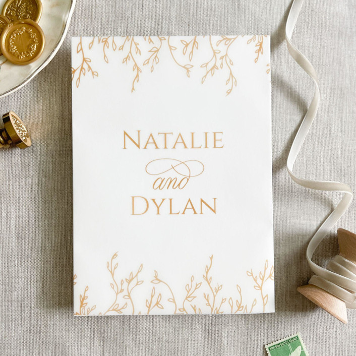 Custom couple's names and botanicals in faux gold vellum wraps for