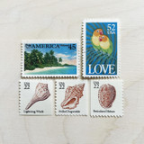 $1.19 cent . Tropical Love vintage postage stamp pack . Set of 5 Postage Stamps